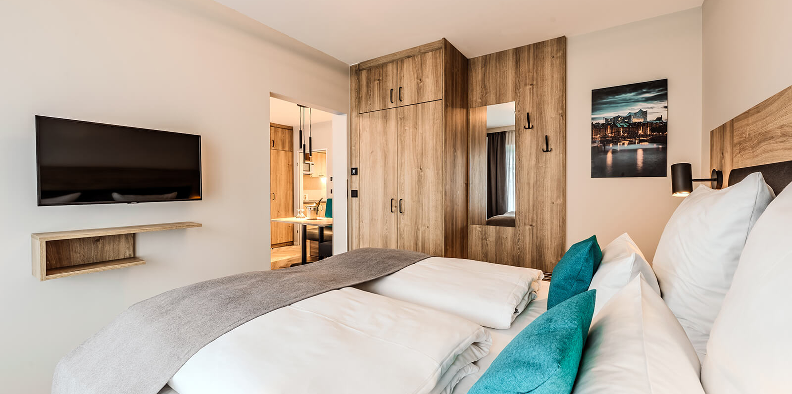 AH Deluxe Family Room with sliding doors and kitchen