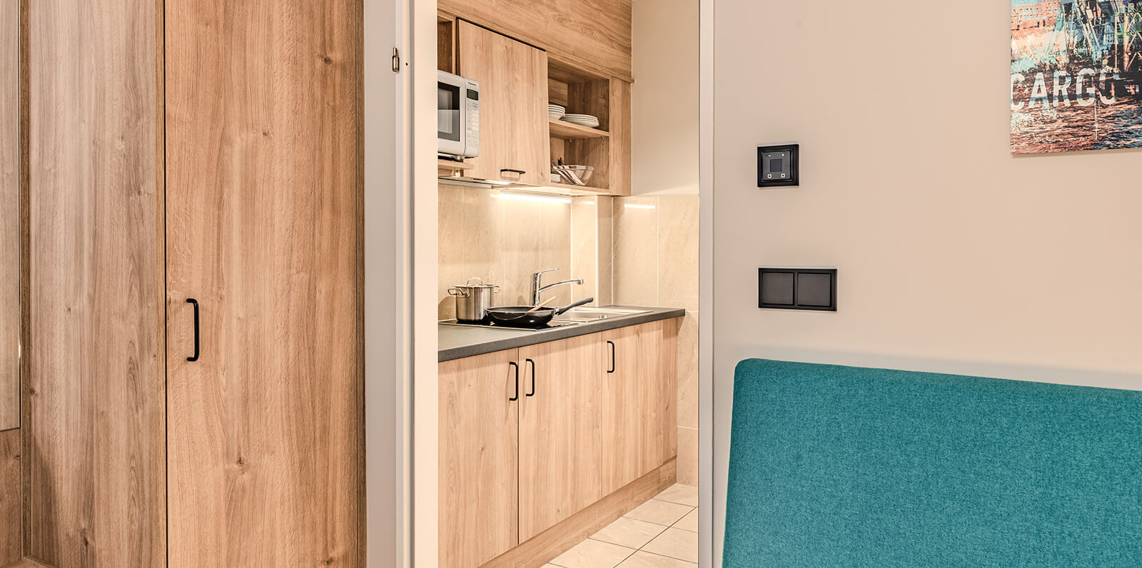 AH Deluxe Family Room with sliding doors and kitchen